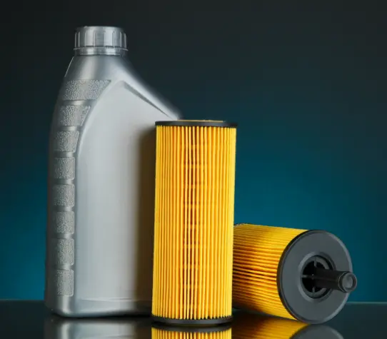 Non-labeled Motor Oil container and two oil filters: examples of HHW