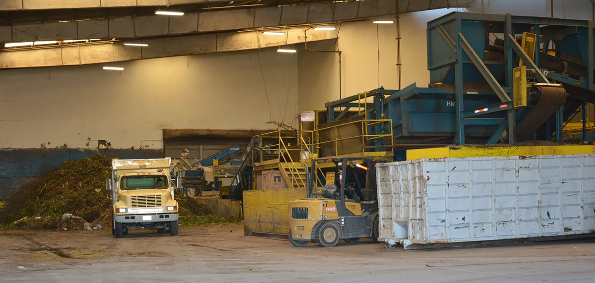 Interior of the Marin Resource Recovery Center with a truck unloading