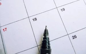 A pen on a calendar - ZWM Agenda Link