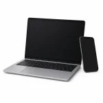 Laptop computer and cell phone.